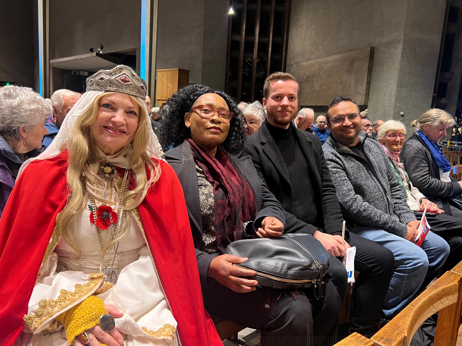 Coventry Diversity Forum community members together at a civic event in Coventry Cathedral